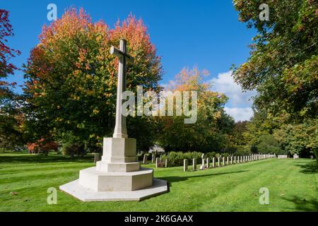 Memorial and graves of Canadian soldiers from the first world war in the churchyard of St Mary's Church in Bramshott, Hampshire, England, UK Stock Photo