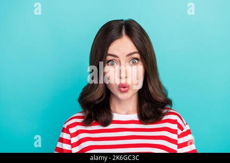 Closeup photo of young adorable cute nice pretty girlish lady pouted lips pretty playful funky oops tricky isolated on aquamarine color background Stock Photo