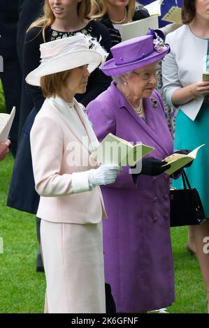 Ascot, Berkshire, UK. 20th June, 2013. Her Majesty the Queen watches the horses in the Parade Ring before her horse wins the Ascot Gold Cup. This was an historic day as it was the first time a reigning monarch had won the Gold Cup. Estimate was ridden by jockey Ryan Moore. Queen Elizabeth II was due to the presentation for the Gold Cup but her son, the Duke of York did the presentation instead. Issue Date: 14th October 2022. Credit: Maureen McLean/Alamy Stock Photo