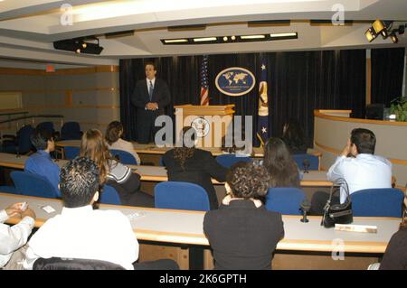 Department officials, including Deputy Secretary Richard Armitage, Assistant Secretary for Western Hemisphere Affairs Roger Noriega, Assistant Secretary for Civil Rights Barbara Pope, and Department Hispanic Recruitment Coordinator Harvey Issa,  speaking to group of Hispanic high school students from Washington, D.C., Virginia, and Maryland participating in Department's inaugural Latino job shadowing day Stock Photo
