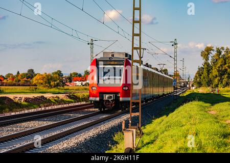 An electric-powered train in local public transport helps with German Mobilitaetswende Stock Photo