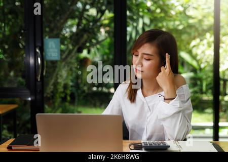 Businesswoman tired, stressed and upset with project work problem. Stock Photo
