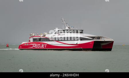 MV Red Jet 7 Red Funnel High Speed Catamaran Passenger Ferry Sailing Into East Cowes Isle Of Wight UK Stock Photo