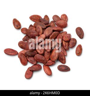 Heap of dried watermelon seeds close up isolated on white background Stock Photo