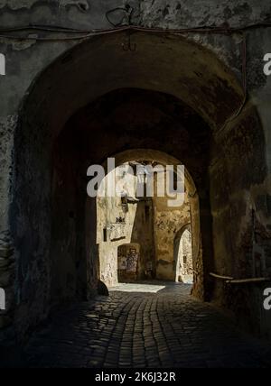 SIGHISOARA, MURES, ROMANIA -  MAY 09, 2021:  Old buildings in the city fortress Sighisoara, Transylvania Stock Photo