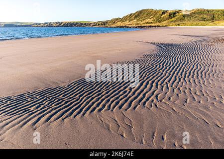 Evening light on patterns in the sand at Ardwell Bay, Dumfries & Galloway, Scotland UK Stock Photo