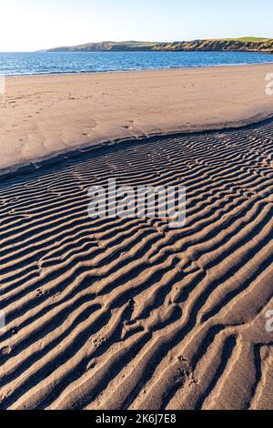 Evening light on patterns in the sand at Ardwell Bay, Dumfries & Galloway, Scotland UK Stock Photo