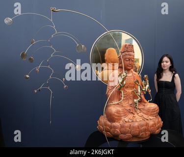 Frieze London opens to the public today at Regents Street.   Pictured: Tuần Andrew Nguyen’s wooden statute of Guanyin from Valerie Quynb.   Image shot Stock Photo