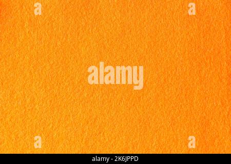 Orange hue color felt textile fabric texture background Stock Photo