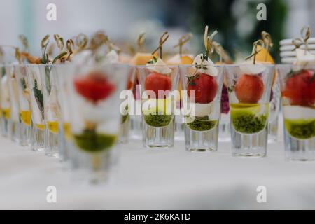 Close-up of snacks on the table, arranged in a row Stock Photo
