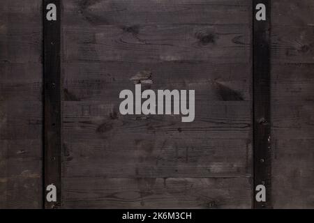 Close up of dark rustic wall made of old wood table planks texture. Rustic black wood table texture background template for your design Stock Photo
