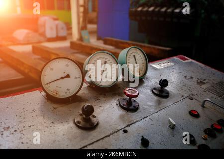 Control panel with buttons and pressure gauge Stock Photo