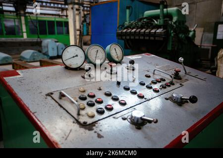 Control panel with buttons and pressure gauge Stock Photo