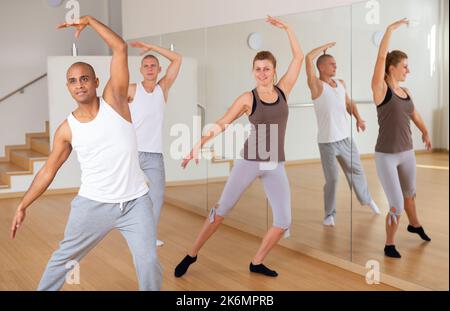 Group of activity people practicing dance techniques Stock Photo
