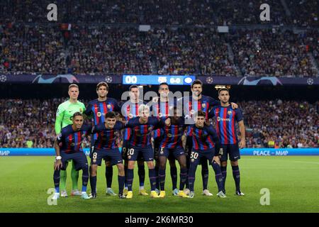 Barcelona, Spain, 12th October 2022. The FC Barcelona starting eleven line up for a team photo prior to kick off, back row ( L to R ); Marc-Andre Ter Stegen, Marcos Alonso, Robert Lewandowski, Sergio Busquets, Gerard Pique and Eric Garcia, front row ( L to R ); Raphinha, Pedri, Sergi Roberto, Ousmane Dembele and Gavi, in the UEFA Champions League match at Camp Nou, Barcelona. Picture credit should read: Jonathan Moscrop / Sportimage Stock Photo