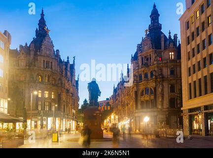 Antwerp, Belgium - August 06, 2022: Baroque buildings and statue of David Teniers the Younger on Leysstraat Stock Photo
