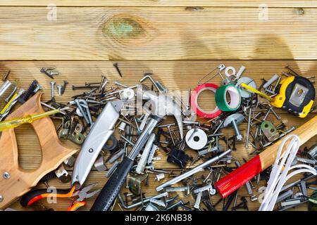 Hand tools for repairing on wooden surface in workshop Stock Photo