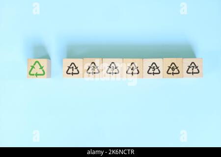 Recycling icon number 1 to 7 icon set symbol on wooden blocks flat lay. Stock Photo