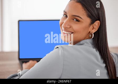 Are you interested in doing business. a young businesswoman using a laptop in an office at work. Stock Photo