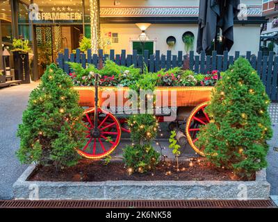 Ischgl, Austria - July 25, 2022: Evening shot of a decorative composition in front of hotel Gramaser in Ischgl, Tyrol Stock Photo