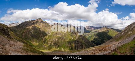 Panoramic view of mountains surrounding Timmelsjoch - Passo del Rombo. It connects the Otztal valley in austrian Tyrol to the Passeier Valley in the I Stock Photo