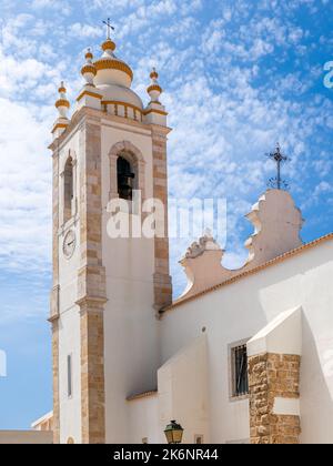 White baroque style bell tower of the church Igreja Matriz (Main Church), also known as Igreja de nossa Senhora da Conceição. Stock Photo