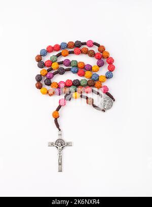 Traditional Christian holy religious wooden rosary isolated on white background Stock Photo