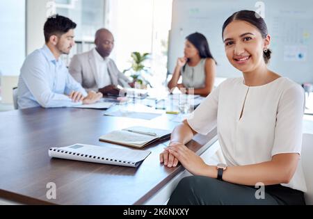 Leader, portrait and woman at meeting table for sales growth, marketing or business strategy with coworkers. Planning, vision and ceo, manager or Stock Photo