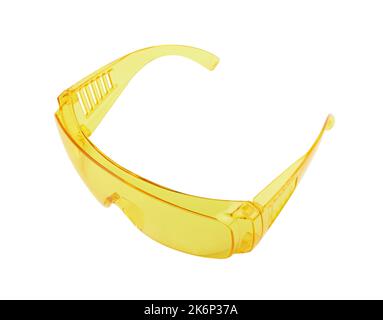 Yellow plastic protective work glasses isolated on a white background Stock Photo