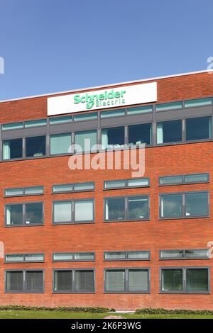 Odense, Denmark - April 2, 2017: Schneider Electric office building. Schneider Electric is a leader in automation and electricity management Stock Photo