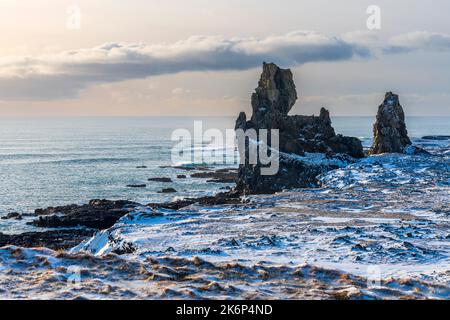 Londrangar, bird rock and the surrounding basalt cliffs, Snaefellsnes peninsula, Iceland, Europe Stock Photo
