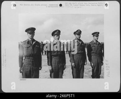 Left to right: 1st Lt. John H. Murphy, San Diego, Calif.; 2nd Lt. Ripley B. Archer, Houston, Texas; 2nd Lt. George W. Bailey, Los Angeles, Calif. And 2nd Lt. Maurice Elstun, Ross, Ohio, all of who received Air Medals. Stock Photo