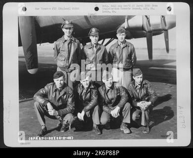 Crew Of The 92Nd Bomb Group Pose Beside Their Boeing B-17 At An Air Base Somewhere In England. 26 February 1945. Stock Photo