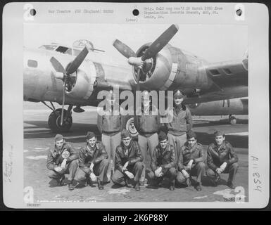 Crew Of The 92Nd Bomb Group Pose Beside Their Boeing B-17 At An Air Base Somewhere In England. 20 April 1945. Stock Photo