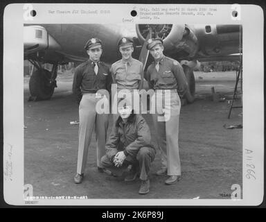 Crew Of The 92Nd Bomb Group Pose Beside Their Boeing B-17 At An Air Base Somewhere In England. 12 May 1945. Stock Photo