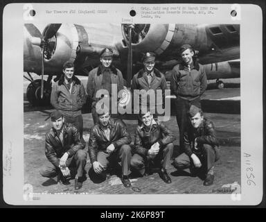 Crew Of The 92Nd Bomb Group Pose Beside Their Boeing B-17 At An Air Base Somewhere In England. 20 April 1945. Stock Photo