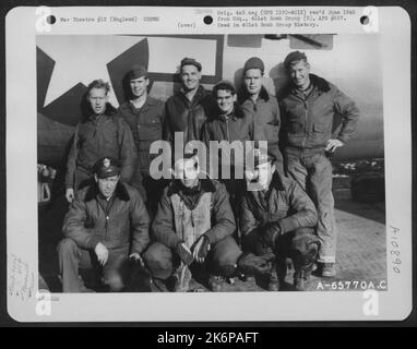 Lt. Udy And Crew Of The 615Th Bomb Squadron, 401St Bomb Group, Beside A Boeing B-17 'Flying Fortress' At An 8Th Air Force Base In England, 31 October 1944. Stock Photo