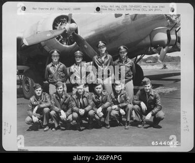 Crew 5 Of The 615Th Bomb Squadron, 401St Bomb Group, Beside A Boeing B-17 'Flying Fortress' At An 8Th Air Force Base In England, 28 June 1944. Stock Photo