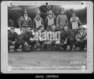 Capt. Livingston, Lt. Wilson And Crew Of The 360Th Bomb Squadron, 303Rd Bomb Group Based In England, Pose In Front Of The Boeing B-17 Flying Fortress. 29 March 1944. Stock Photo