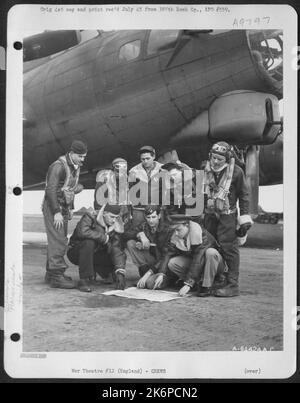 Crew Of The 563Rd Bomb Squadron, 388Th Bomb Group, On The Wing Of A ...