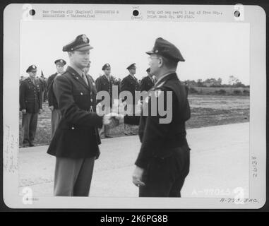 Lt. Gen. Lewis H. Brereton Congratulates A Member Of The 391St Bomb Group On Receiving The Distinguished Flying Cross During A Ceremony At An Air Base In England. 19 July 1944. Stock Photo