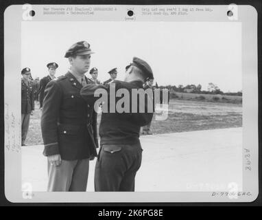 Lt. Gen. Lewis H. Brereton Congratulates A Member Of The 391St Bomb Group On Receiving The Distinguished Flying Cross During A Ceremony At An Air Base In England. 19 July 1944. Stock Photo