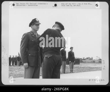 Lt. Gen. Lewis H. Brereton Congratulates A Member Of The 391St Bomb Group On Receiving The Distinguished Flying Cross During A Ceremony At An Air Base In England. 19 July 1944. Stock Photo