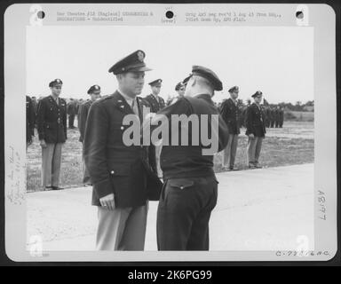 Lt. Gen. Lewis H. Brereton Congratulates A Member Of The 391St Bomb Group On Receiving The Distinguished Flying Cross During A Ceremony At An Air Base In England. 19 July 1944. Stock Photo