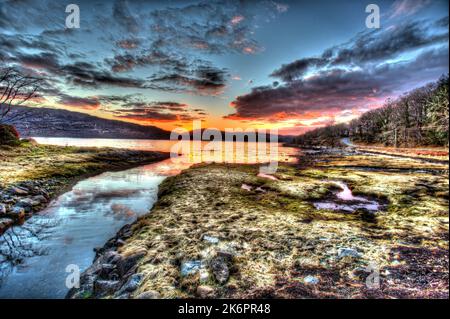 Peninsula of Ardamurchan, Scotland. Artistic sunset view of a river inlet with Loch Sunart in the background. Stock Photo