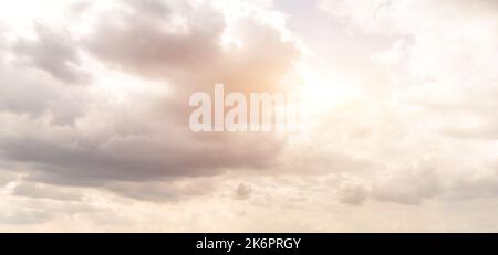 Beautiful sky background. Clouds block the sunlight and shine through Stock Photo