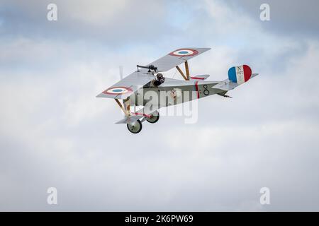 Nieuport 17 N1977 ‘G-BWMJ’ airborne at the Race Day airshow held at Shuttleworth on the 2nd October 2022 Stock Photo