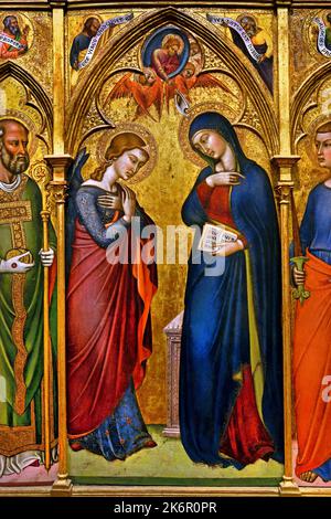 The Annunciation with Saints, Luca di Tommè 1396-1389, Florence, Italy. (  Annunciation with, St.Francis, St.Nicholas, St.Thomas, Sainted Evangelist, The Prophets Elijah, Aaron, Malachi and Isaiah ) middle panel. Stock Photo