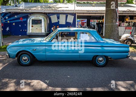 Falcon Heights, MN - June 19, 2022: High perspective side view of a 1963 Ford Falcon 2 Door Sedan at a local car show. Stock Photo