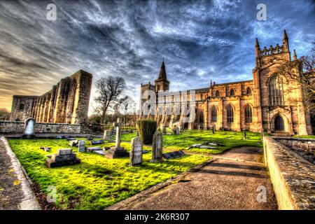 City of Dunfermline, Scotland. Artistic view of the southern façade of Dunfermline Abbey, with the palace on the left. Stock Photo